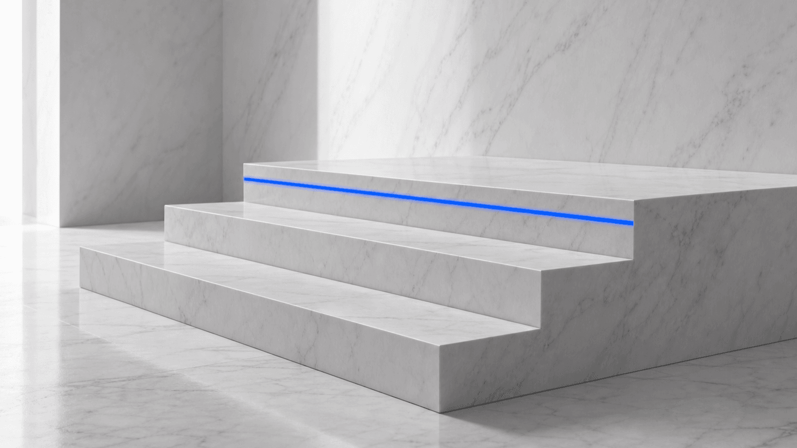 A polished marble ascending three-step plinth with a thin cobalt light strip embedded in the top riser